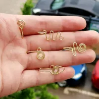 Joyas hechas a mano Al por mayor anillos de nariz falso de joya de tabique de oro/plataforma de nariz plateada clip no penetrante en anillos de nariz sintética para mujeres hombres