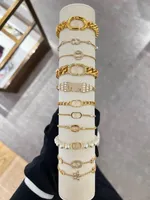 Lyxdesigner Simple Star Moon Zircon Pearl Armband för kvinnliga damer Söta eleganta utsökta glänsande länkkedja armband charmkanal smycken cd hänge halsband