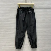 22 Primavera Nuovo classico Triangolo invertito Lettera di metallo Elastico P Home Pantaloni casual Nylon GX2770