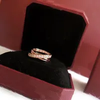 Moda Designer Pierścienie Rose Gold Pierścień 25 Srebro Silver Luksusowe Projektanci Biżuterii Cross Diamond Love Pierścienie Engagements dla kobiet 22041203r