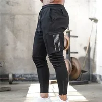 Модные мужские спортивные брюки Joggers Fitness Casual Long Pants Мужчины тренировки тощие спортивные штаны Jogger.