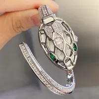고품질 인기있는 여성 쿼츠 시계 패션 33mm 스테인리스 스틸 골드 다이얼 방수 성격 성격 뱀 다이아몬드 디자이너 시계 Montre