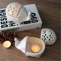 Cerámica creativa con vela nórdica estilo hueco elefante vela soporte de manualidades elegantes para la decoración del hogar