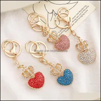 Accessori per la moda per portachiavi 4 colori Diamond Love for Women Heart Crown Torychain Creative Peach Borse Penderant Dhval
