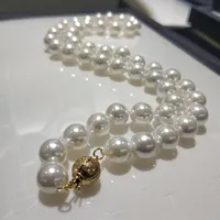 Joyería de collar de perlas de concha jyx 8-8.5 mm redondo blanco marino natural de 18 "collares superiores de alto nivel264g
