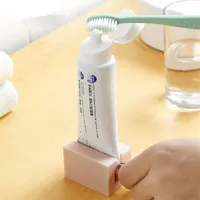 Home Plastik Zahnpasta Squeezer Tube Easy Dispenser Rolling Halter Badezimmer Versorgung Zahnreinigungszubehör