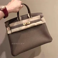 herme handbag BIRKINs Master handmade leisure lock pocket bag BK platinum Togo leather litchi grain calfskin
