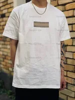 Designers homens camiseta co-marca caixa logotipo tee logotipo impressão redonda colarinho de manga curta para homens e mulheres camisetas de streetwear casais