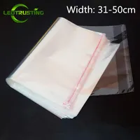 Leotrusting 100 stcs 31-50 cm breedte grote heldere opp klassende tas transparante poly hersluitbare verpakkingszak zelf plastic geschenk;