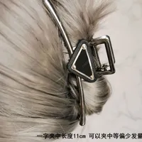 豪華なファッションデザイナーヘアクリップ爪の三角形のカニのクリップヒョウ穀物プラグのためのヘアアクセサリージュエリーヘアバンドnew 22033103R