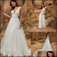 Boutique OCN Dresses 2022 Jumpsuits Wedding Dress V Neck med löstagbar lång kjol Pärlade spetsapplikationer Bridal Gow Bridegroomdh Dhik9