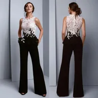 Women Jumpsuits 2020 Prom Dresses Black And White Lace Evening Dresses With Pockets Saudi Arabic Long Formal Dress Sexy Pant Suits226j