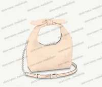 Pourquoi nœud PM Perfored Mahina Leather Bag M20700 crème beige femme nouée de nœuds de poignée de concepteur