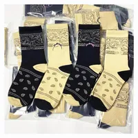 Дизайнерский кешью цветочные носки подделка на лицевые спортивные чулки хип -хоп.