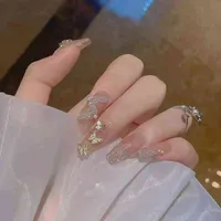 Nxy false Nägel tragen Rüstungen von Hand Nagel Patch gefälschte Nagel fertiges Produkt rotes Schmetterling Kettenbohreis nackte Farbe transparent weiß