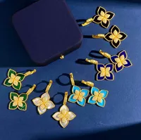 Ny designad dangle ￶rh￤nge rhombic fyrbladkl￶ver pendellkvinnor lycka halsband full diamant fyra kronblad blomma turkos erhombiska errringar designer smycken e02