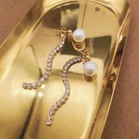 Design elegante ad alta lucida iperbole palla perla penzola lady 316l in acciaio inossidabile orecchini lunghi orecchini orecchini a cerchio gioielli alla moda all'ingrosso