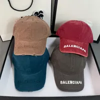 Heren- en damesontwerpers Casquette Sports denim scheurde ball caps solide kleur b letter buiten paar hoeden