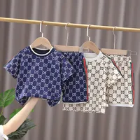 2022 yeni erkek yaz giysileri set bebek kısa kollu takım elbise yakışıklı yabancı yarı kollu t-shirt 1-5 yaşında çocuk