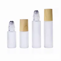 Frosted Clear Glass Roller Bottles 5ml 10ml Roll on Bottle with Metal Roller Ball Wood Grain Plastic Lids for Perfume Essential Oil Lip Balms Cosmetic Packaging