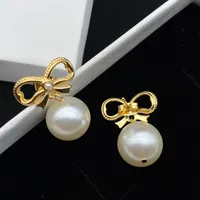 Designer Bow Tie Earring Stud voor dames sieraden hoepel oorbellen mode Pearl Gold Burgingen Mens Luxe Earring Studs Geschenk 2207123D