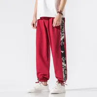 Pantalon masculin de style chinois en lin rouge streetwear imprimé large jambe masculine joggle masculin harem drop pantersmen's