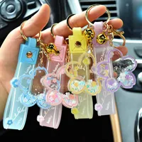Kreatives Öl Sakura Blütenschlüsselketten Frauen Flüssigkeit Pailla Keyring Charme Bag Auto Anhänger Schlüsselkette für Kinder Geschenk