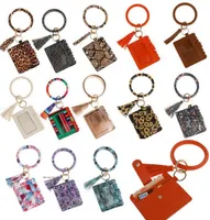 40 estilos PU leopardo leopardo borla bracelete sacos de chaveiros saco de cartão de identificação plutonos pulseira carteiras keyring bolsa de pulseira para acessórios de mulher