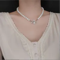 Einfache Flash Diamond Saturn Anhänger Halskette voller Diamantplanet Perlenschkepplungskette Weiblich