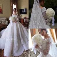 2020 Ball Gown Wedding Dresses Dubai Off Shoulder Lace Tulle Applique Long Sleeve Wedding Gowns Sweep Train Sequins Vintage Bridal271J