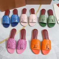 Summer Beach Slippers Classic Designer Lady Flat Baotou Flip Flops 100 ٪ شرائح جلدية من جلد الغزال