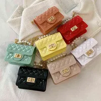 Xiaoxiangfeng parent-child bag pearl handbag girls&#039; rubber chain diagonal cross bag change children&#039;s bag