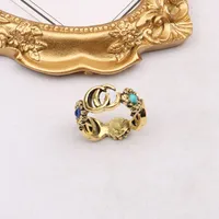 Top Quality 18K Gold Plated Brand Letter Band Rings for Mens Womens Fashion Designer Brand Letters Turquoise Crystal Metal Daisy Ring Opening Adjustable Jewelry
