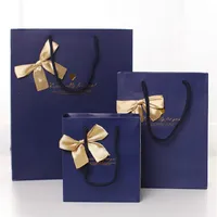 17 * 22 * ​​7 cm Noble Qualité Bowknot Papier Cadeau Sac Cadeau D'affaires Faveurs Emballage Sac Festive Cadeau Paquet Parti Fournitures 20pcs / lot WS084