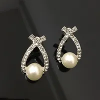 Crystal Stud Pendientes Cruz Rhinestone Pendientes de perlas Oro y plata plateó la joyería de moda para mujer DHL envío gratis