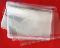 claro saco autoadesivo Seal OPP 22 * ​​33 centímetros 100pcs completa, transparente selada com cola roupas tira sacos de embalagem / arquivo saco de recolha