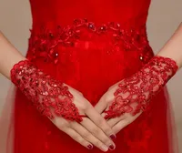 Nueva llegada del partido de la mujer de encaje apliques Beads sin dedos longitud de la muñeca con cinta Guantes de novia Accesorios de boda 3colors envío gratis