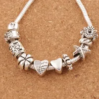 Trevligt design hjärta stort hål distansmetaller lösa pärlor 140pcs / lot tibetansk silver passform charm armband lm37