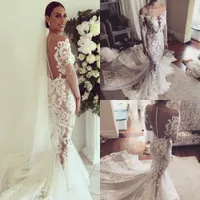 Sexig Illusion Lace Mermaid Bröllopsklänningar Brudklänningar med Långärmad Sheer Neckline Backless Vestidos de Novia Trumpet Court Train