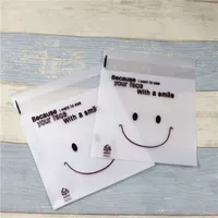 Bolsas de Regalo 300pcs / lot-14x16.5cm / 11x13.5cm Frosted Lächeln Gesichtstasche Keks Süßigkeiten Selbstklebende DIY Backenpaket Lebensmittel Verpackungstaschen