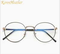 青色の軽いガラス、韓国のバージョン、レトロな円形の金属のアイフレーム、絶妙な普通の眼鏡、男性と女性のメガネ。