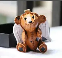 Bolsa conejito perro cadena de mano del diseñador del ángel Llavero de la moda colgante creativo individual colgante animal