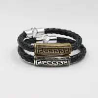 Bracelet en acier inoxydable de titane de corde de cuir fait main de corde de cuir de mode européenne et américaine le grand fabricant de mur