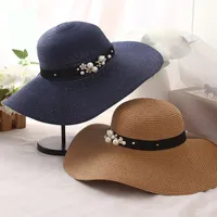 Nuevos oZyc de primavera y verano los sombreros para granos de la flor de las mujeres de ala ancha sombreros de Panamá Jazz Chapéu Femenino parasol sombrero de la playa Cappello