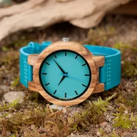 BOBO 100% ébano clásico madera Saat azul cuero cuarzo relojes de lujo para hombres mujeres en personalización de la caja de regalos OEM reloj de pulsera