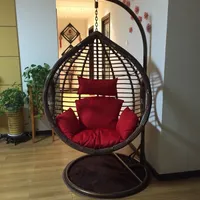 Rough rattan livingroom bedroom balcony hanging chair swing rocking leisure chair with armrest and Pedal footrest