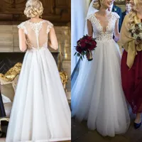 Tulle Ivory Beach Brautkleider Juwel Hals Spitze Appliques Sheer Backless Brautkleider Günstige nach Maß bodenlangen Hochzeitskleid