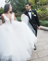 Puffy A-Line White Satin Wedding Dresses Illusion Patrz jednak V przednie Seksowne suknie ślubne Backless Country Bride Suknie