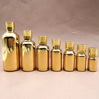5ml 10ml 15ml 30ml Guldglasflaskaflaskor Essential Oljeflaska med skruvlock Parfymflaskor Fast Frakt F1184