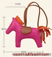 新しいホットファッション女性バッグ装飾デザイナー本物のレザーハンドメイドの馬のバッグチャーム送料無料